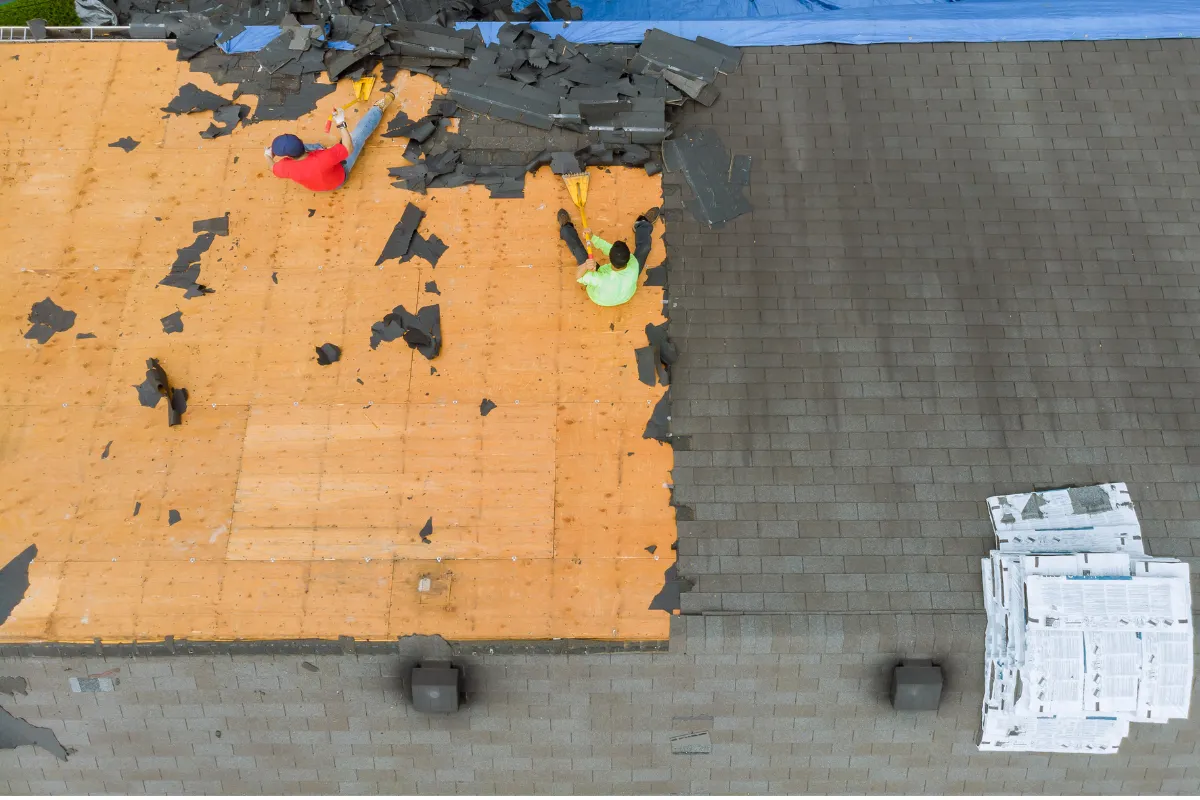 Aerial view of roof tear-off during replacement Charlotte NC